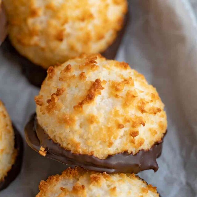 coconut dessert half dipped in chocolate