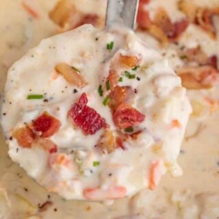 Chowder in a ladle.