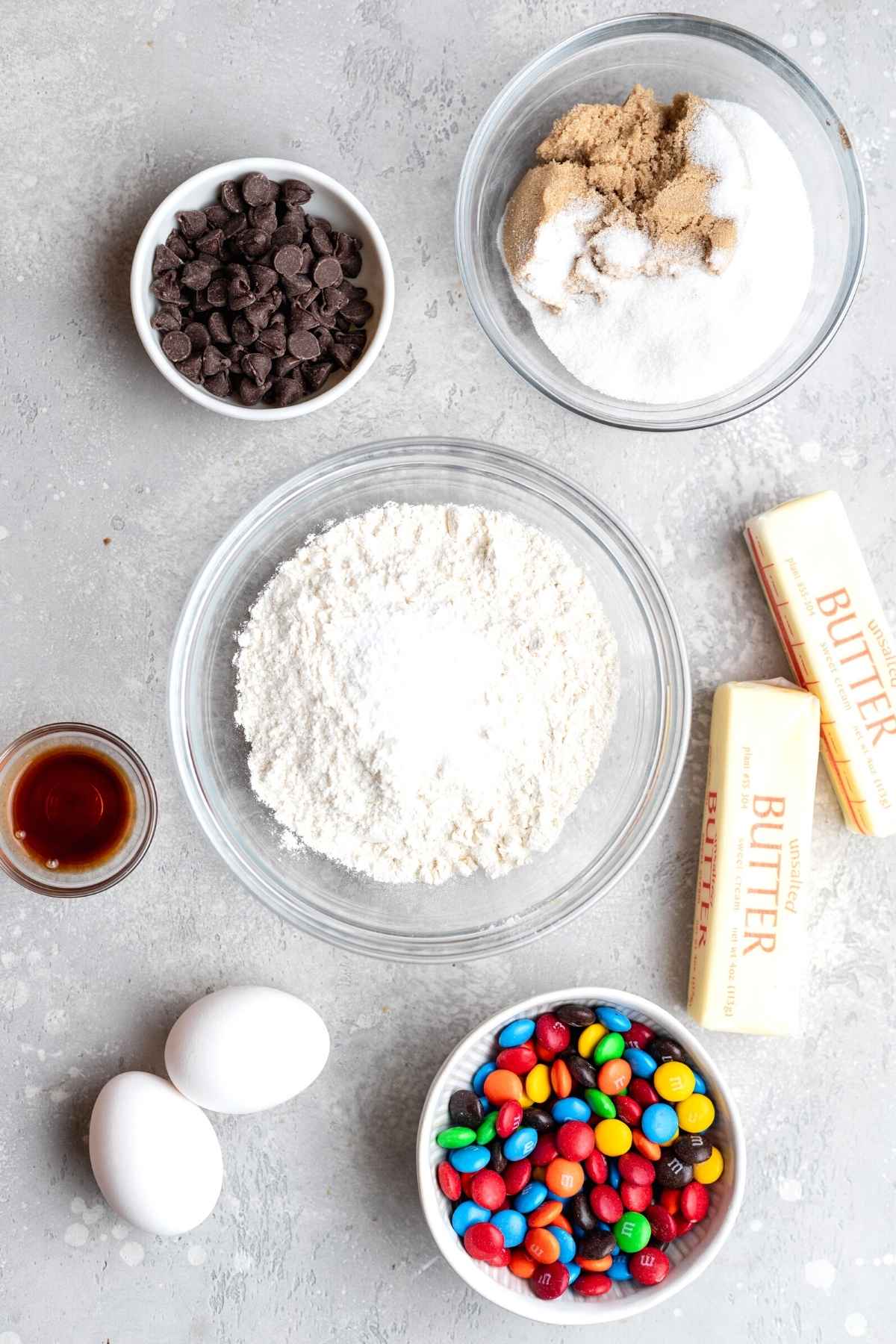 M&M Cookies ingredients in mixing bowls