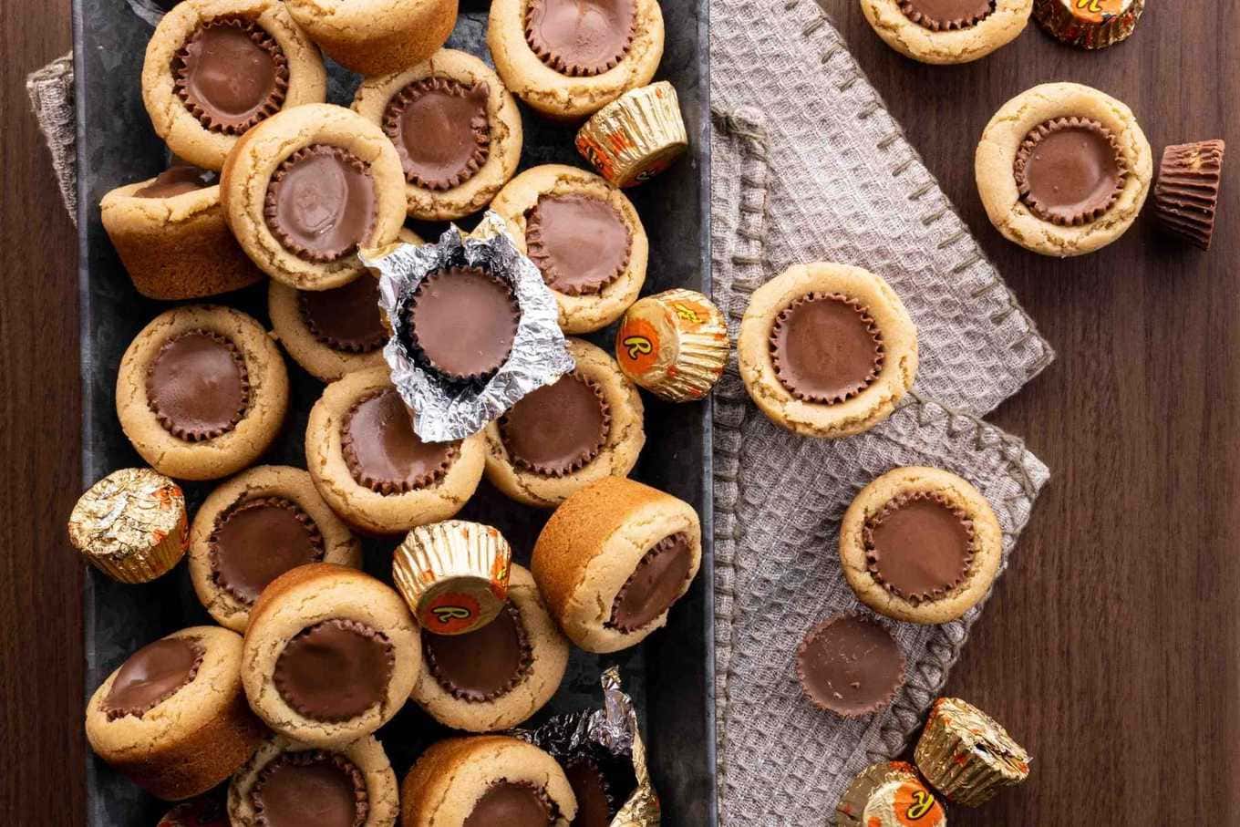 Peanut Butter Cup Cookies on serving plate with peanut butter cups