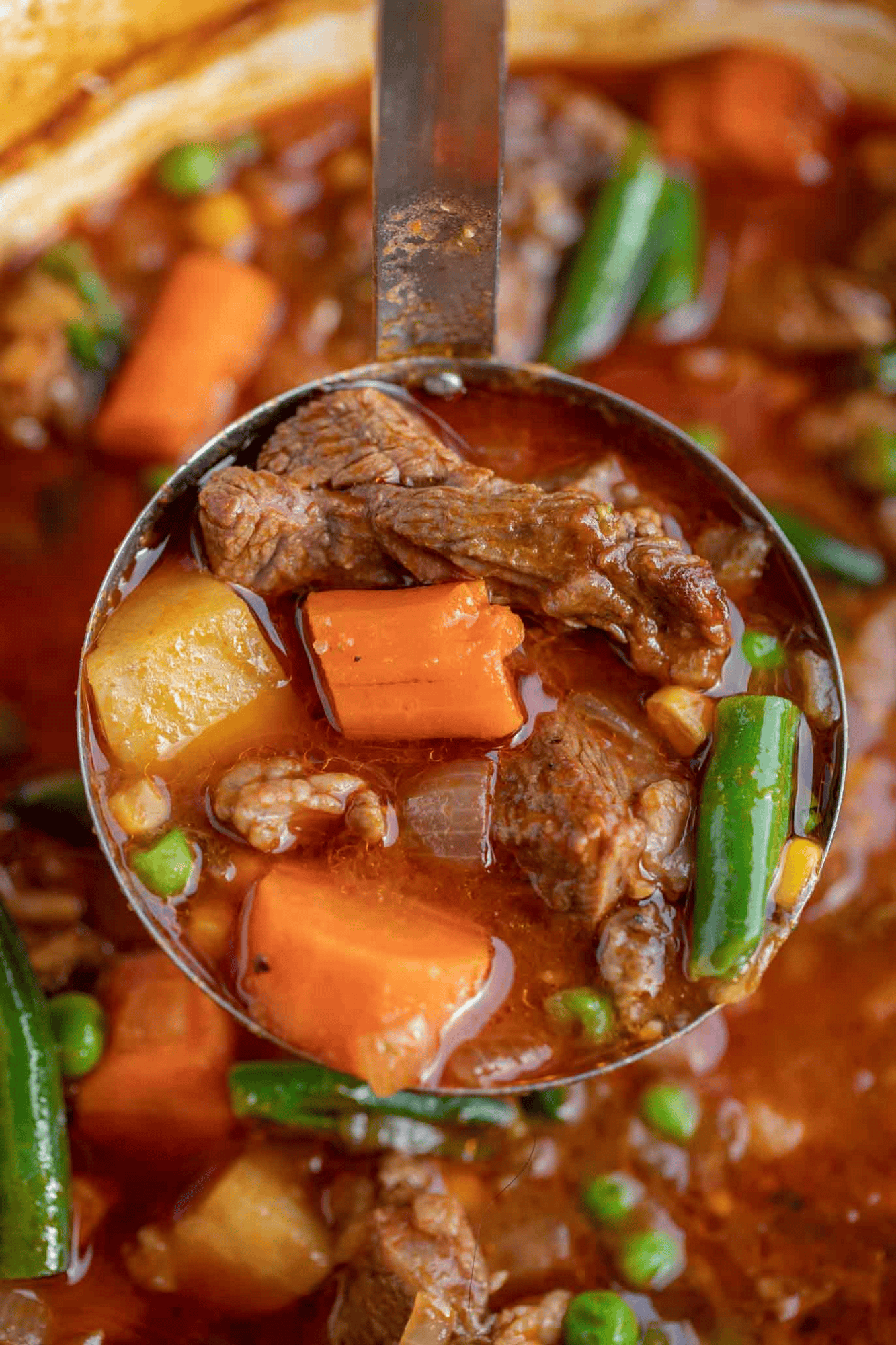 Ladling beef stew
