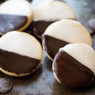 Cookies laid out with melting chocolates