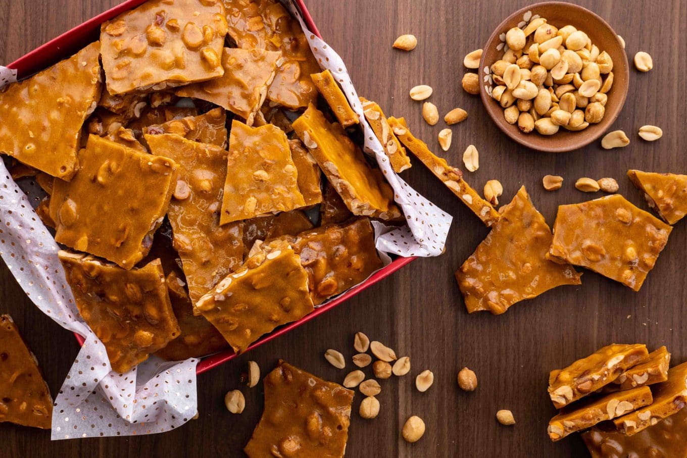 Classic Peanut Brittle in red gift box with bowl of peanuts
