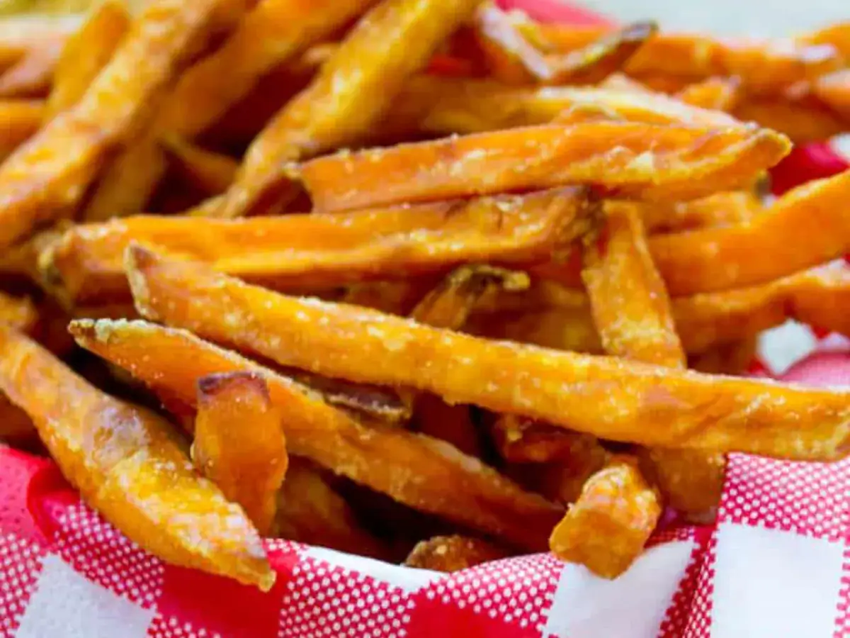 close up sweet potato fries in basket