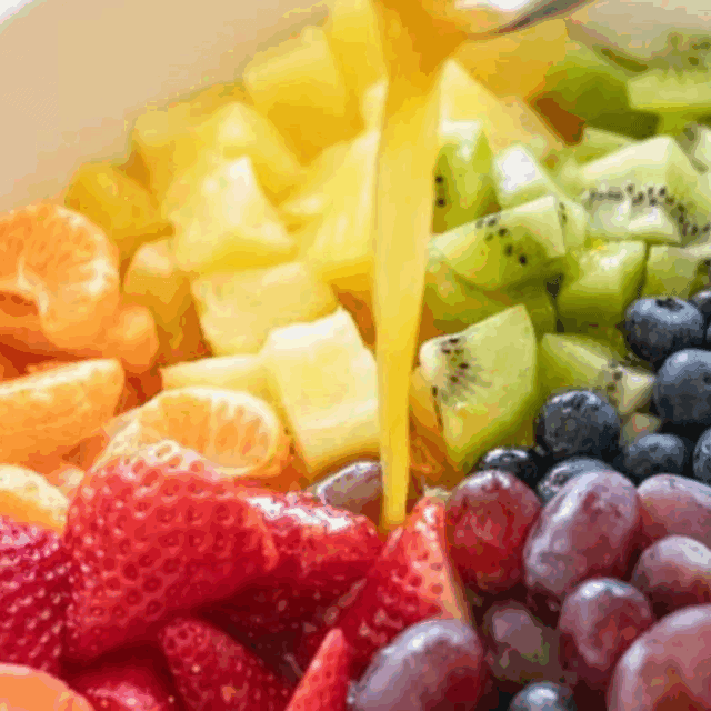 pouring dressing on salad.