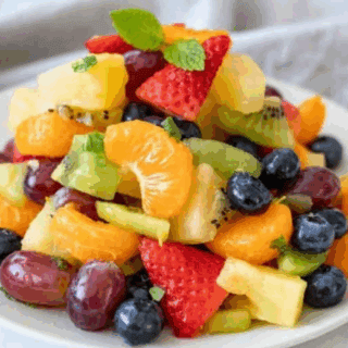 Salad served on a white plate