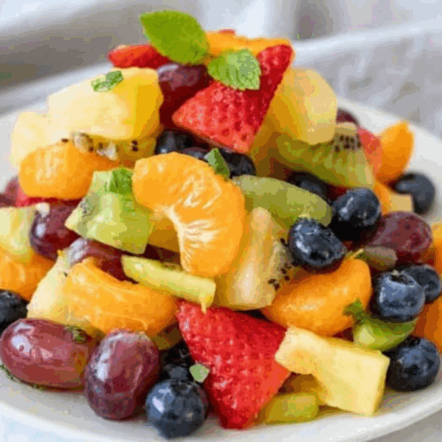 Salad served on a white plate