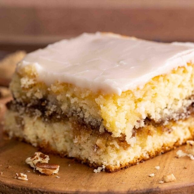 Honey Bun Cake slice on plate from side view