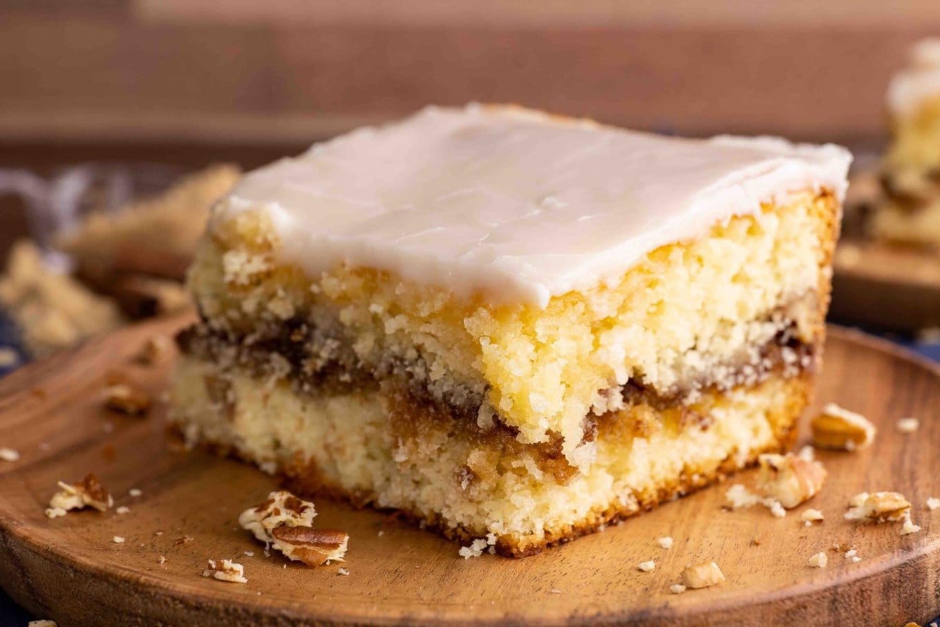 Honey Bun Cake slice on plate from side view