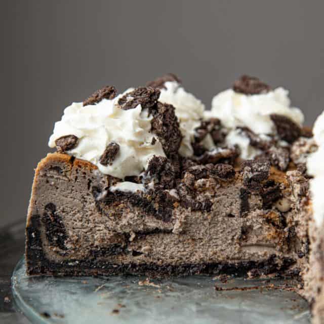 Cross-section of Oreo Cheesecake on glass plate