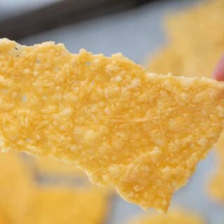 Hands holding out a crisps