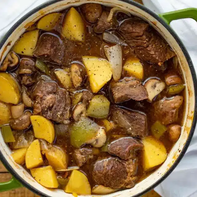 stew in a pot with meat and potatoes