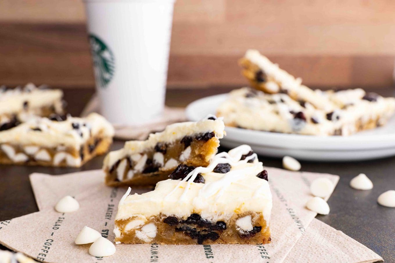 Starbucks Cranberry Bliss Bars with coffee cup