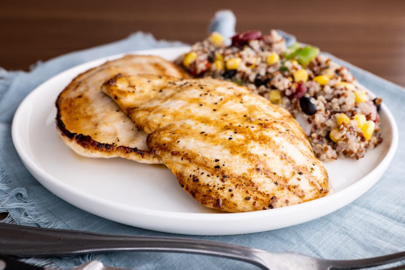 Easy Grilled Chicken on plate with quinoa salad