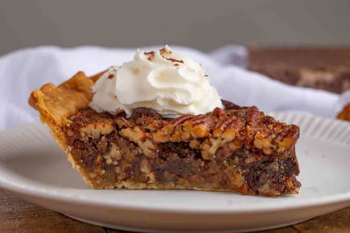 Slice of Chocolate Pecan Pie on plate