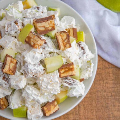 Snickers Apple Salad in white bowl from top down