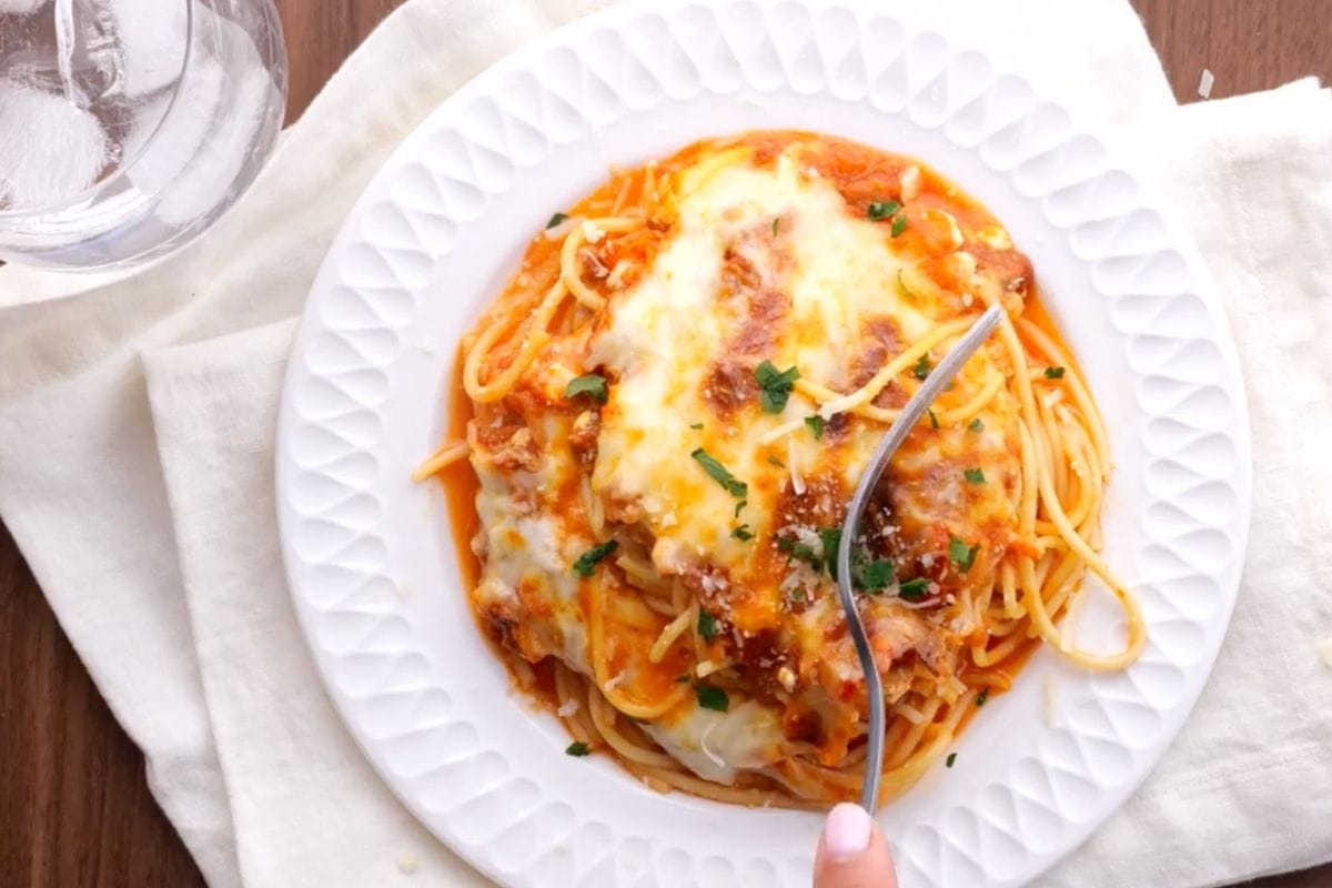 Baked Spaghetti on plate with fork