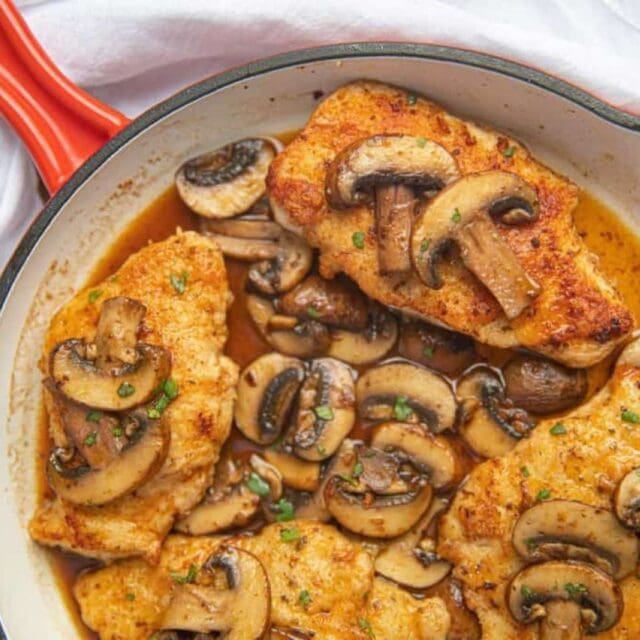 Chicken with mushroom sauce in a pan