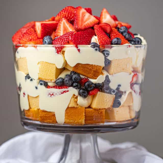 Classic Trifle with strawberries and blueberries in large trifle dish