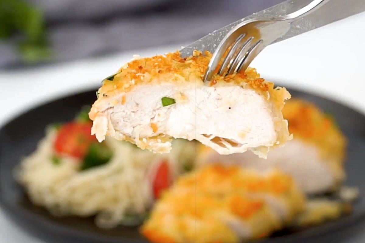 Parmesan Crusted Chicken bite on fork