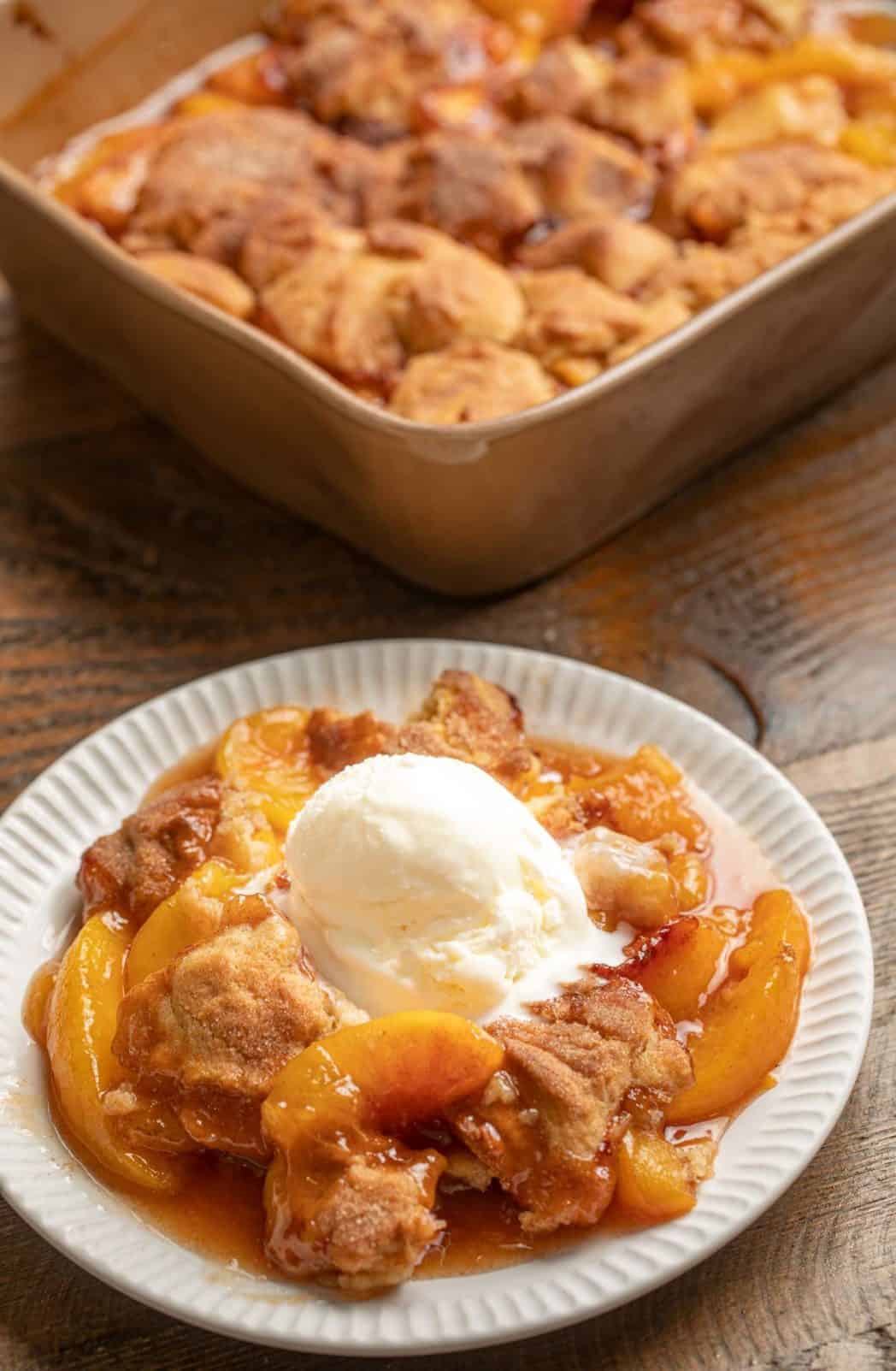 Peach Cobbler and Vanilla Ice Cream on plate