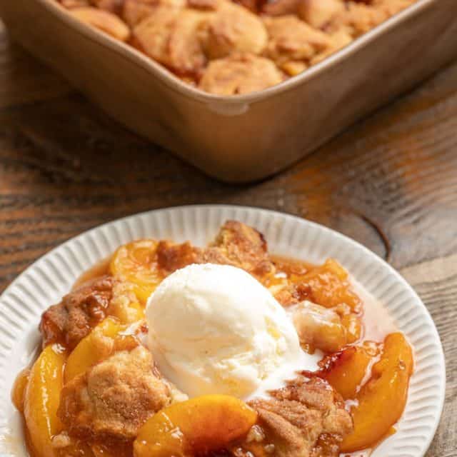 Peach Cobbler and Vanilla Ice Cream on plate