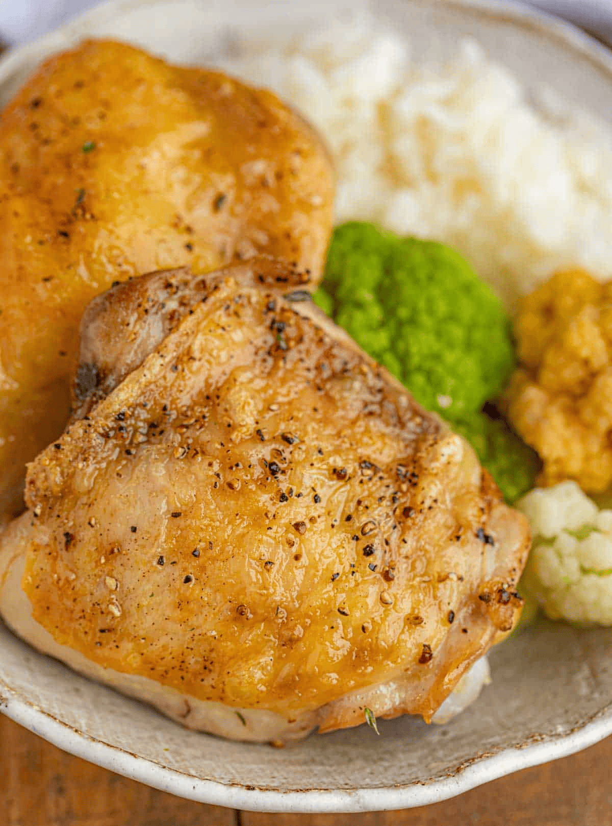 Plated chicken with vegetables and rice