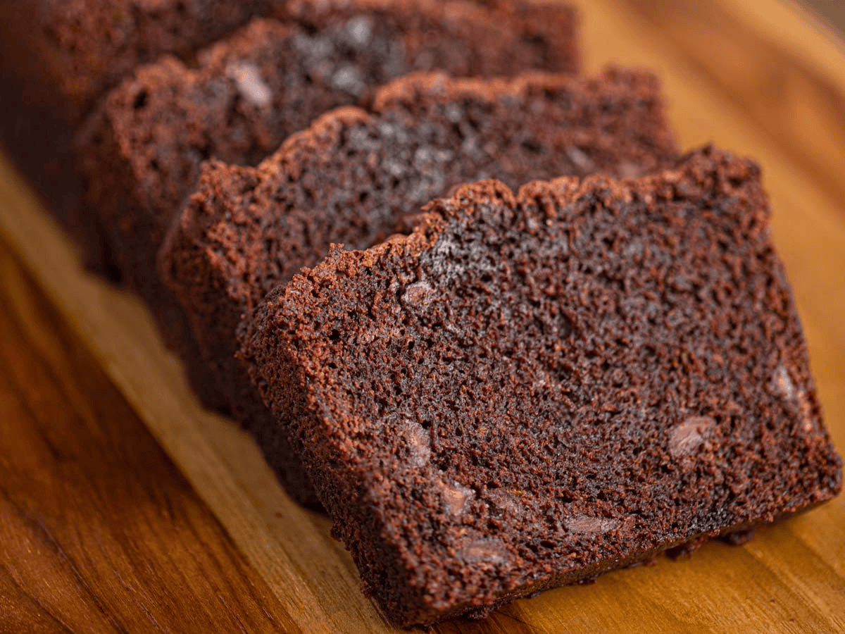 brown bread slices leaned against one another on a cutting board