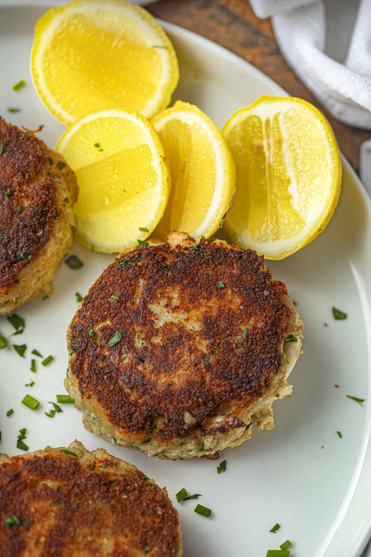 Crab Cake on plate with lemon