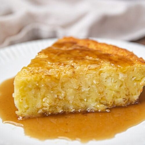 A slice of Bonefish Grill Coconut Pie with Rum Sauce