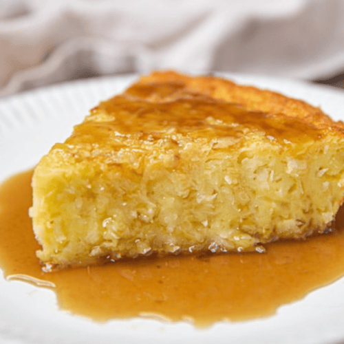 slice of pie on plate with sauce