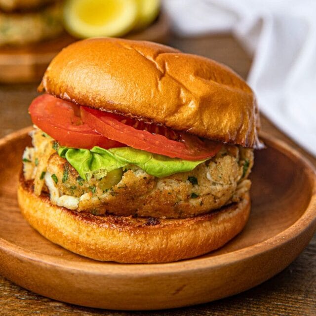 Crab patty on brioche bun with lettuce and tomato