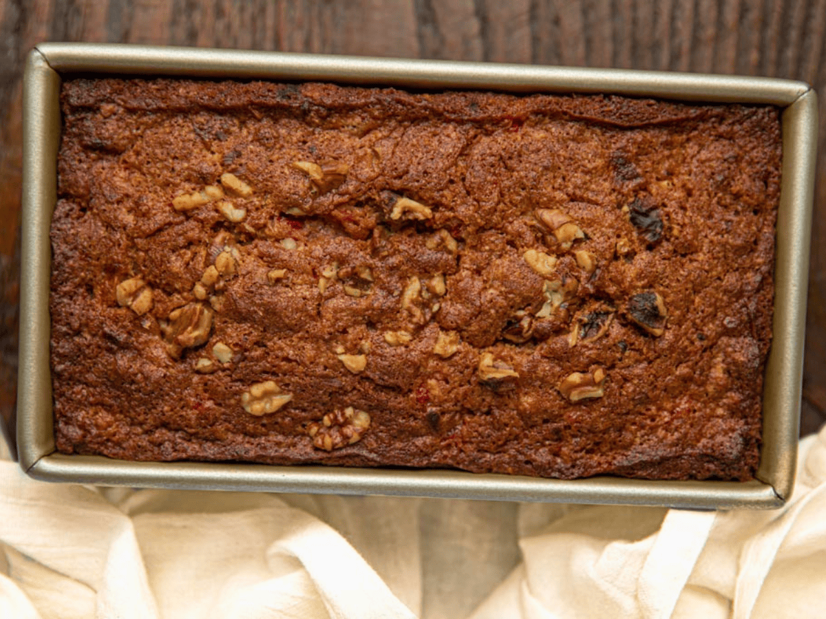 baked tropical bread with nuts in loaf pan