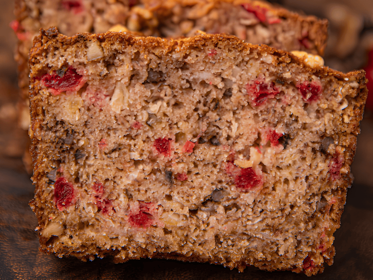 sliced tropical bread with nuts leaned against one another