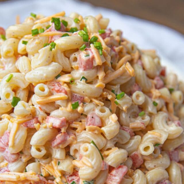 Macaroni salad with pimentos on serving dish