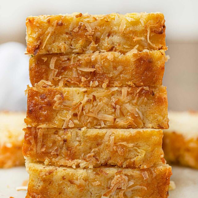 Pineapple Coconut Bread stacked on cutting board