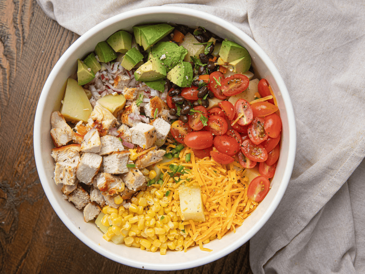 Ingredients ready to be mixed together with dressing