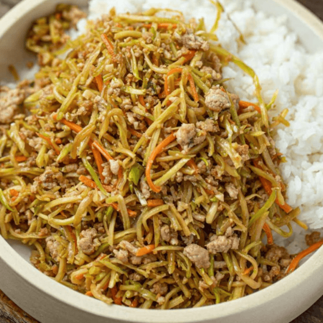 pork and slaw mix with rice in a bowl