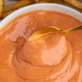 Bowl of sauce with spoon