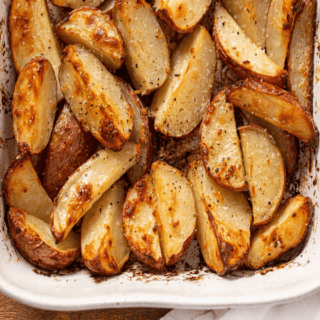 Cooked Potatoes in a white baking dish