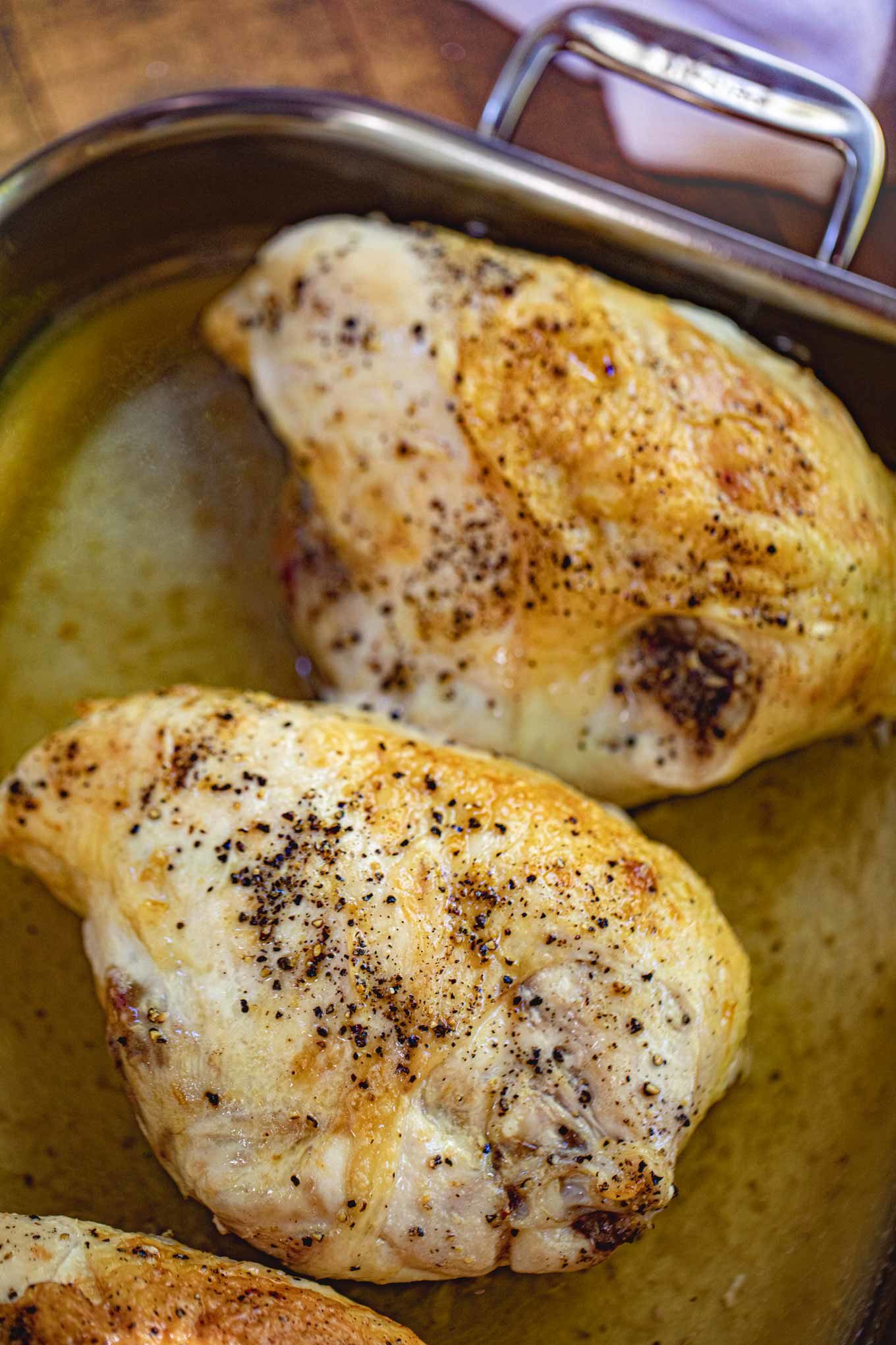 Baked Chicken Breasts with rib bones and skin