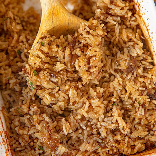 Stick of Butter Rice with Spoon in serving dish