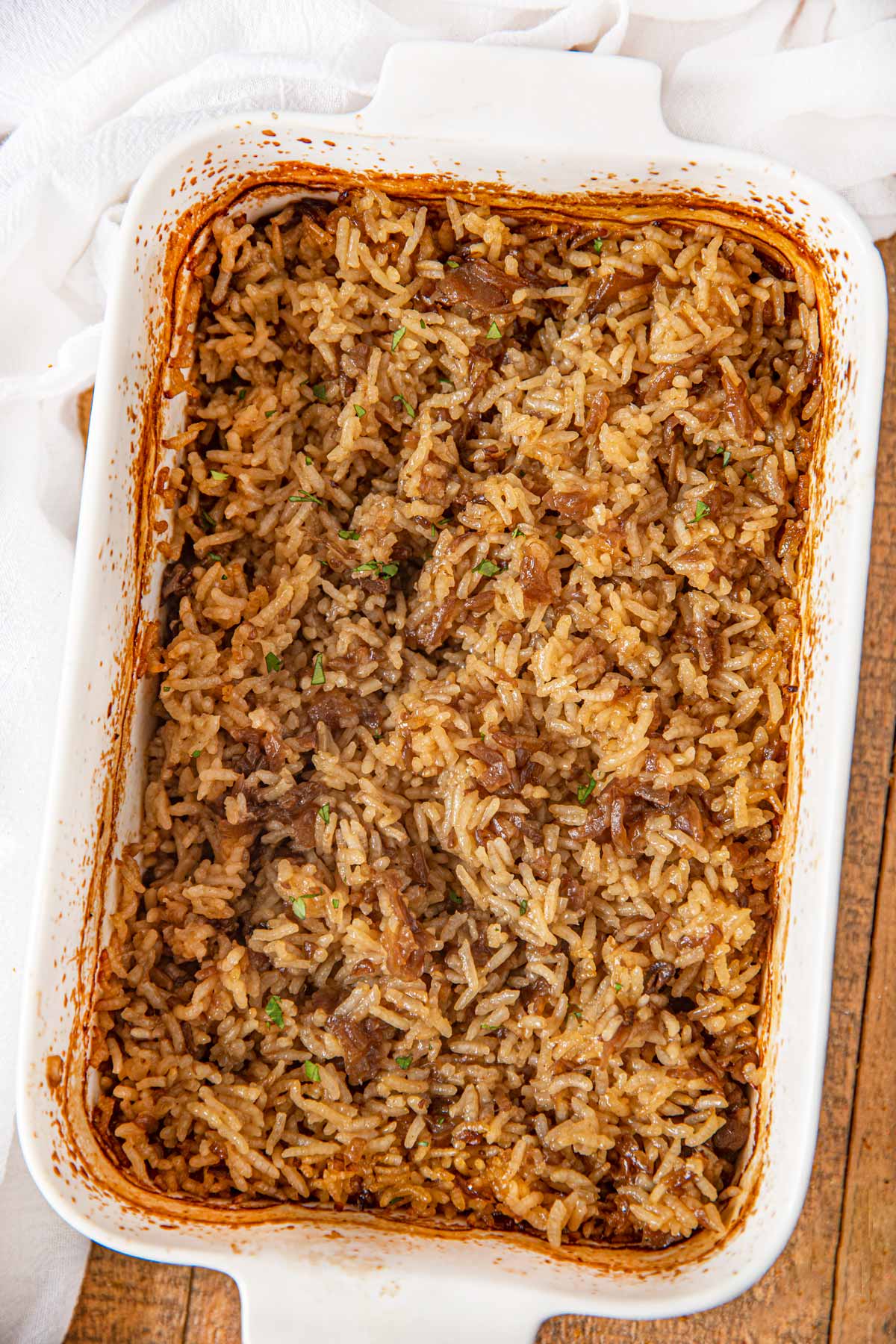 Stick of butter rice in White baking dish