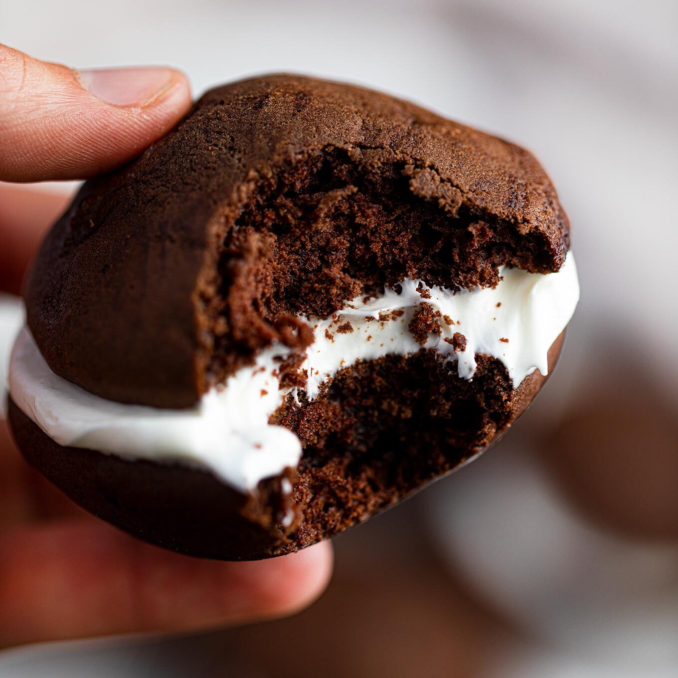 Chocolate Whoopie Pie with bite taken out