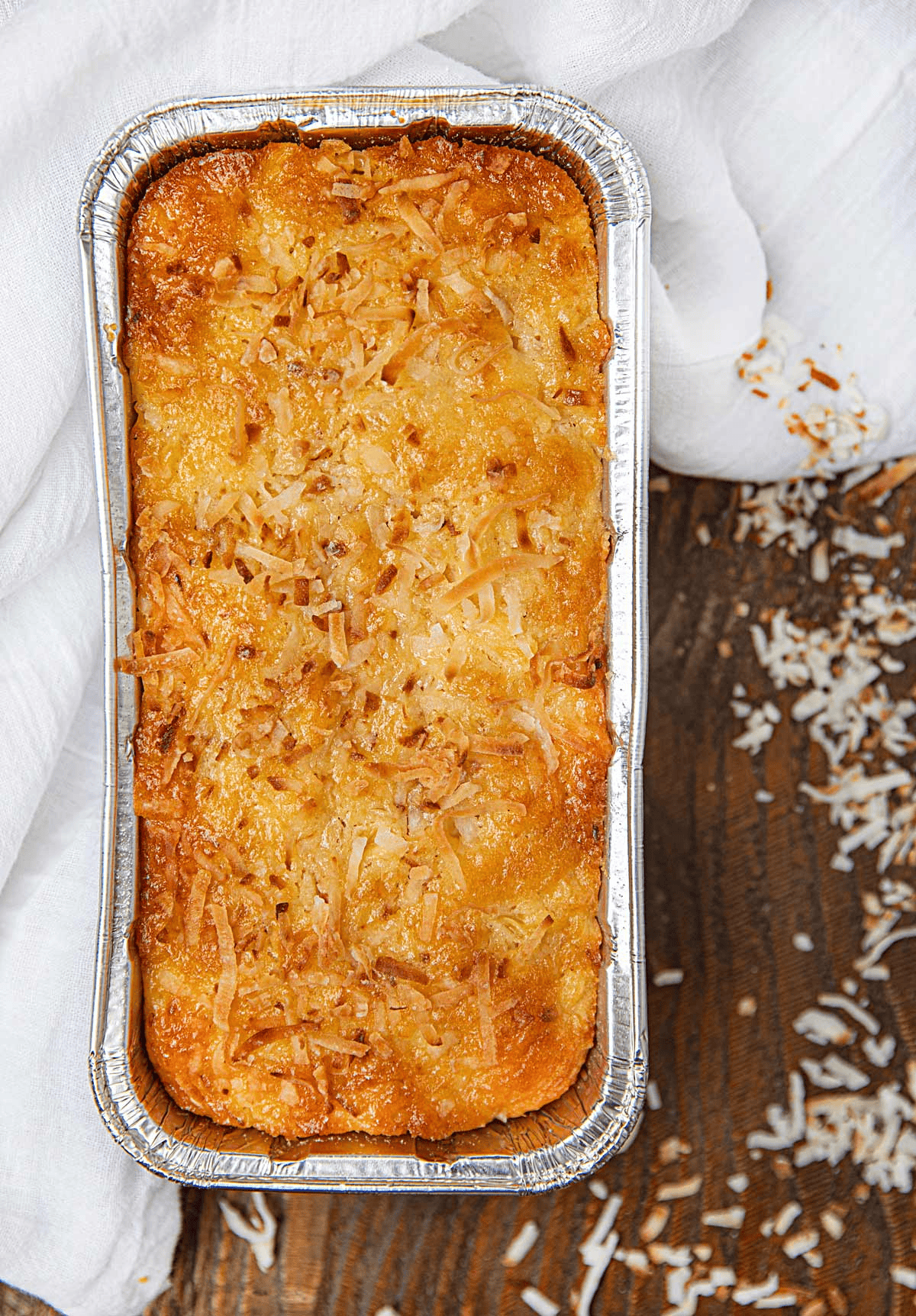 Baked bread loaf with browned pineapple topping from above