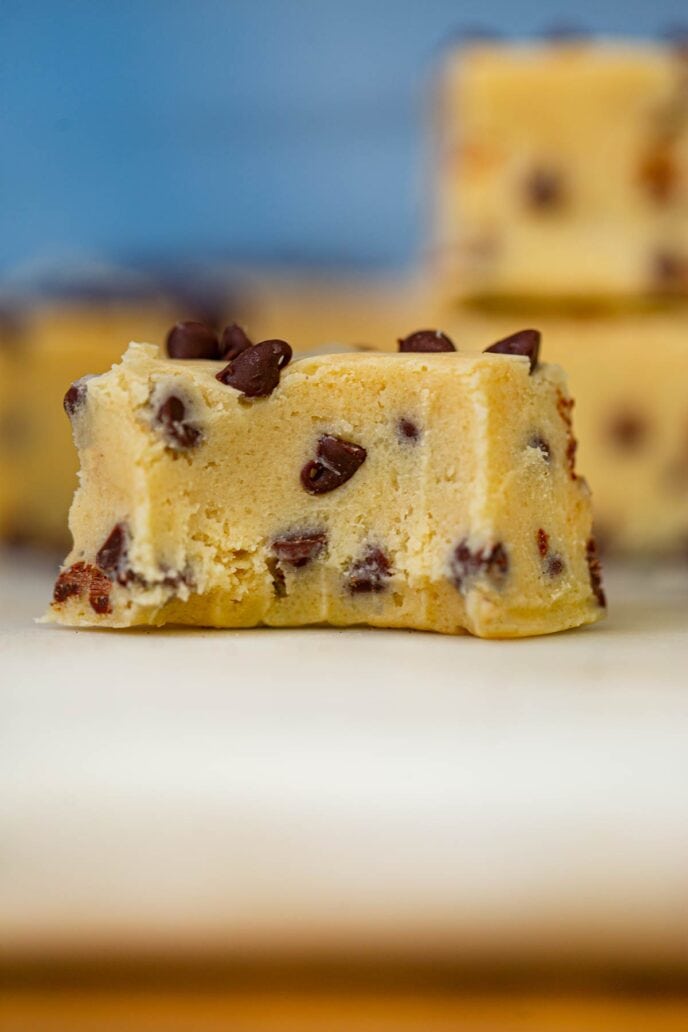 Cookie Dough Fudge on board with bite taken out of it
