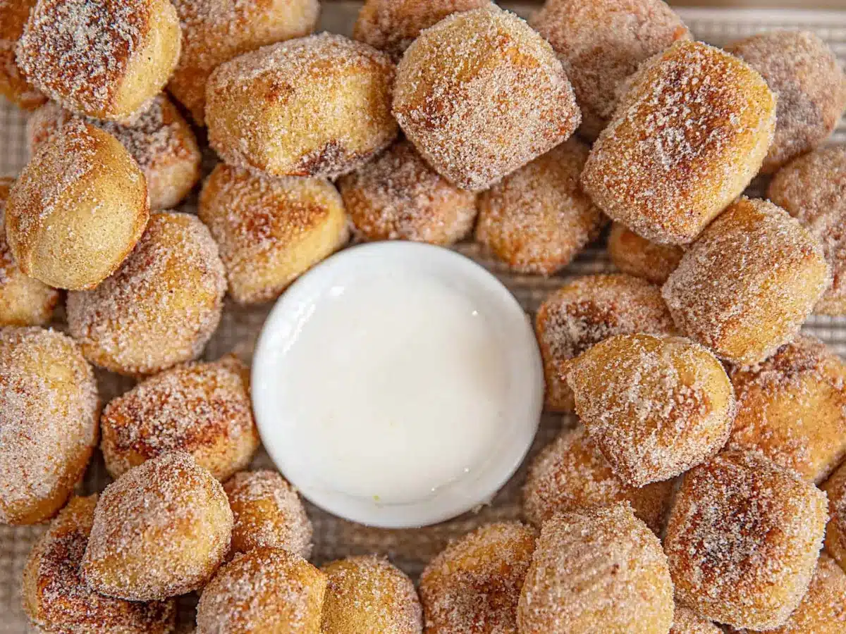 bites on a tray with dipping sauce 