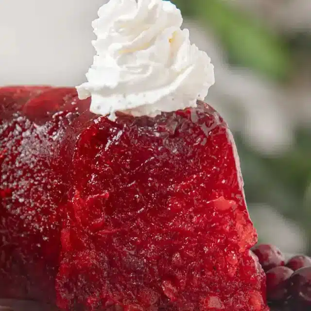 side view of salad topped with cream
