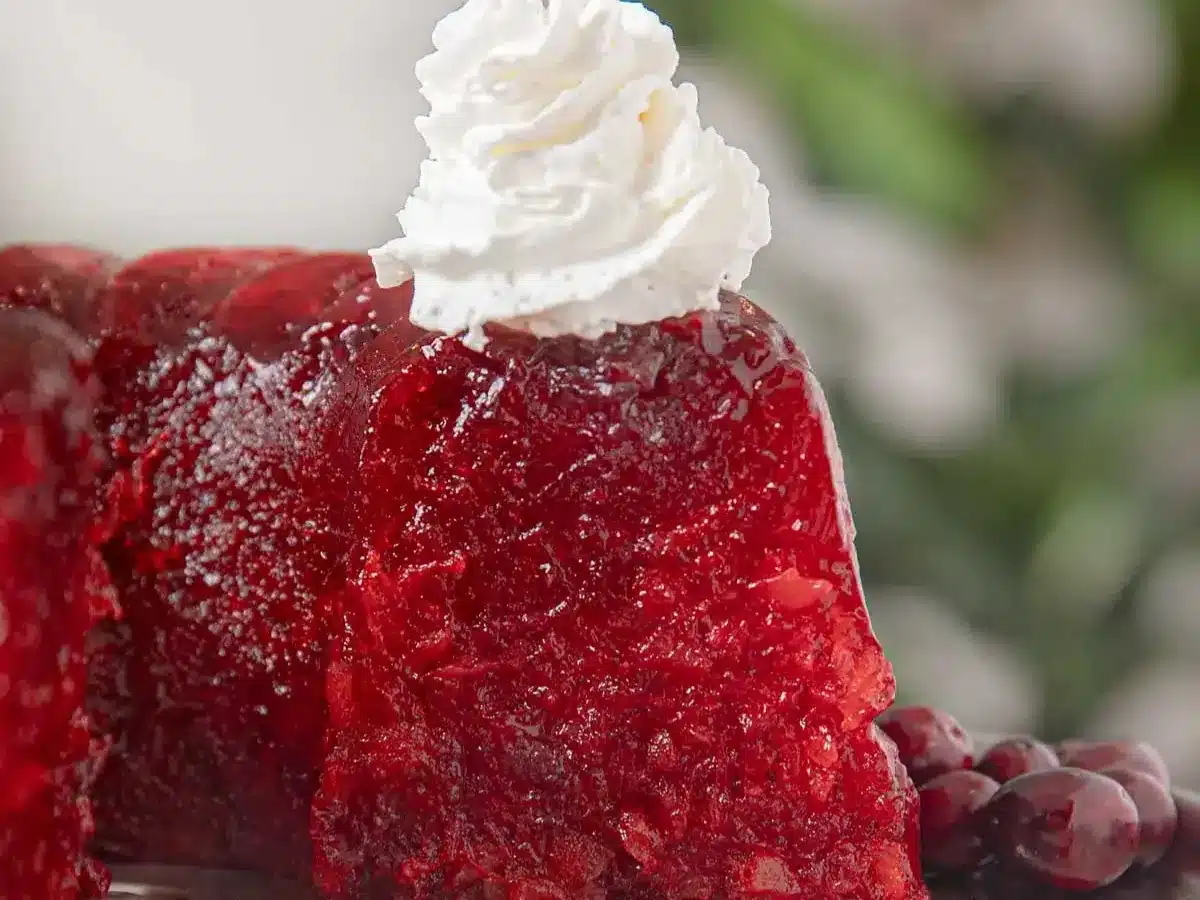 side view of salad topped with cream