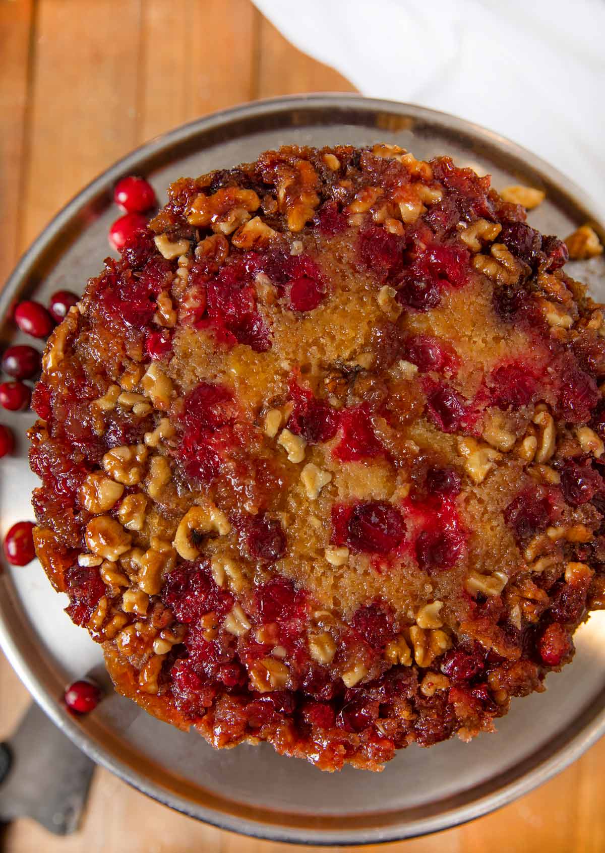 Cranberry Upside Down Cake on cake stand